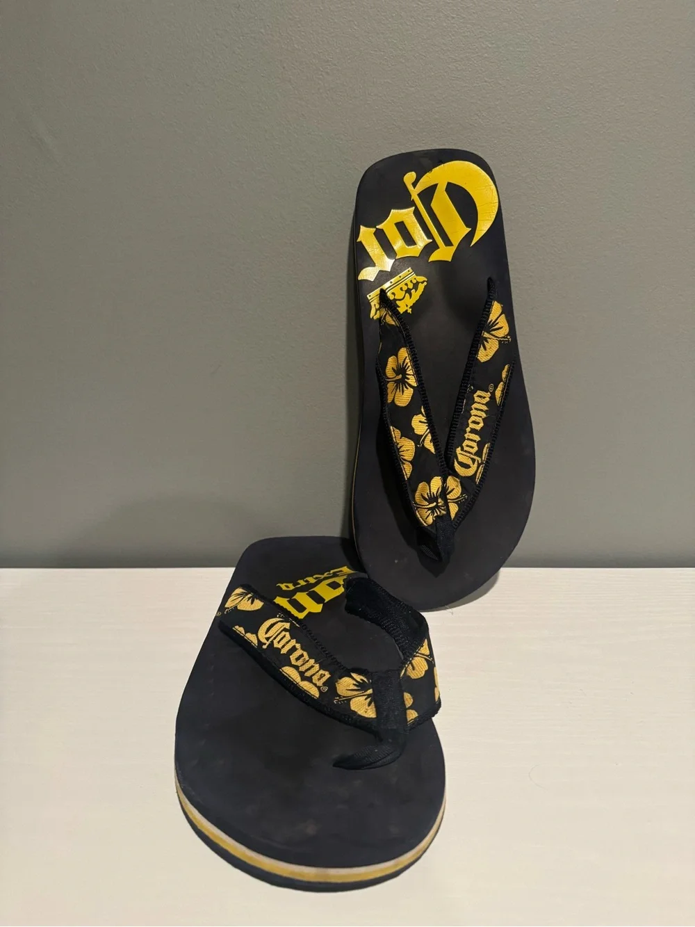 Corona Black and Yellow Hibiscus Flip Flops see photos for measurement